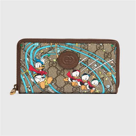 Disney x Gucci Donald Duck zip around wallet .